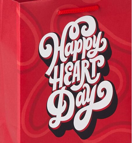 Hallmark 8" Medium Valentine's Day Gift Bags with Tissue Paper (3 Bags: Red with Black, Pink, White Stripes and Hearts) in Kuwait