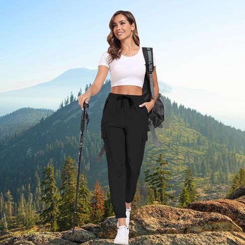 سراويل للمشي لمسافات طويلة للنساء UPF 50+ البضائع سريعة الجفاف مقاومة للماء خصر مرن جيوب بسحاب السفر العمل خفيف الوزن الجري in Kuwait