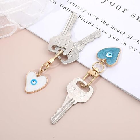 2Pcs Colorful Evil Eye Keychain for Women, Heart Shape Good Luck Car Key Chain Charms for Purse Decorations, Creative Bag Charms Protection Pendant for Tote Handbags Accessories (Blue Pink) in Saudi Arabia