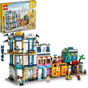 Lego Creator Main Street 31141 Building Toy Set ، 3 في 1 يتميز بمبنى Toy City Art Deco ، وفندق Market Street ، ومتجر لموسيقى المقهى ، و 6 أرقام صغيرة ، وإمكانيات لعب لا نهاية لها للبنين والبنات