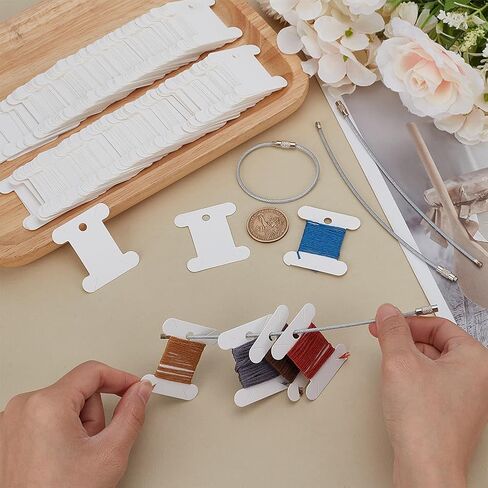 FINGERINSPIRE 100 PCS Embroidery Floss Bobbins Thread Winder with 4 PCS Iron Floss Bobbin Hinged Ring 1.77x1.57inch White Paper Thread Winding Board Floss Bobbin Thread Card for Sewing Thread Storage in Saudi Arabia