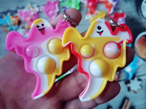 100 Packs Bulk Halloween Ghost Fidget Mini Pop for Kids Party Favors and Classroom Students Gifts in Kuwait