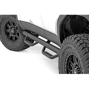​Rough Country Nerf Step Bars for Toyota Land Cruiser (2024-2025) - Rugged Cab Length Nerf Bar with Side Steps, Bolt-On Install