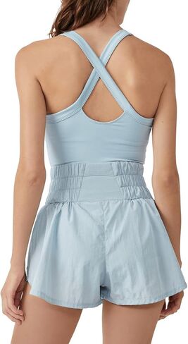 Women's Sleeveless Tennis Dress Solid Color Athletic Mini Dress Workout Golf Dress with Shorts Underneath in Saudi Arabia