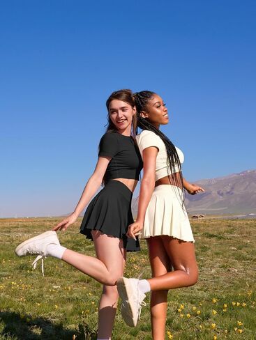 OQQ Women Mini Skirts 2 in 1 Flowy Basic Versatile Stretchy Flared Casual A-line Skirt with Pockets in Kuwait
