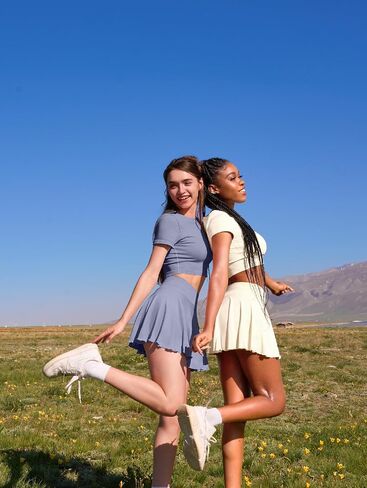 OQQ Women Mini Skirts 2 in 1 Flowy Basic Versatile Stretchy Flared Casual A-line Skirt with Pockets in Kuwait