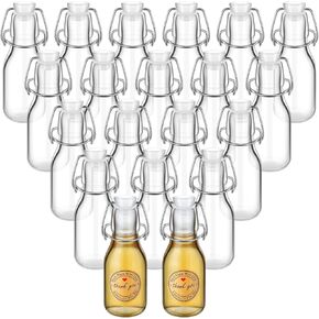 Queekay 20 PCS Mini Flip Top Glass Bottle مع سدادات زخرفية زخرفية أعلى زجاجات مع أغطية ملصقات مستديرة للاصطدامات Kraft لاستخراج الفانيليا محلي الصنع حفل زفاف تحت عنوان حفل الزفاف