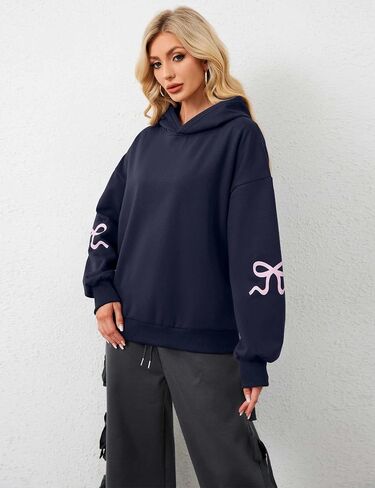 OLAPTA Women Oversized Bow Trim Print Hoodies Long Sleeve Fleeced Casual Graphic Pullover Trendy Fall Hooded Sweatshirts Top in Saudi Arabia
