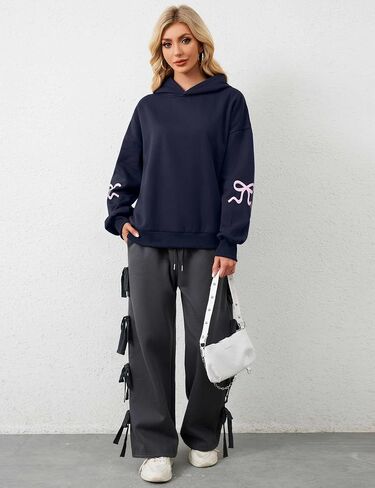 OLAPTA Women Oversized Bow Trim Print Hoodies Long Sleeve Fleeced Casual Graphic Pullover Trendy Fall Hooded Sweatshirts Top in Saudi Arabia