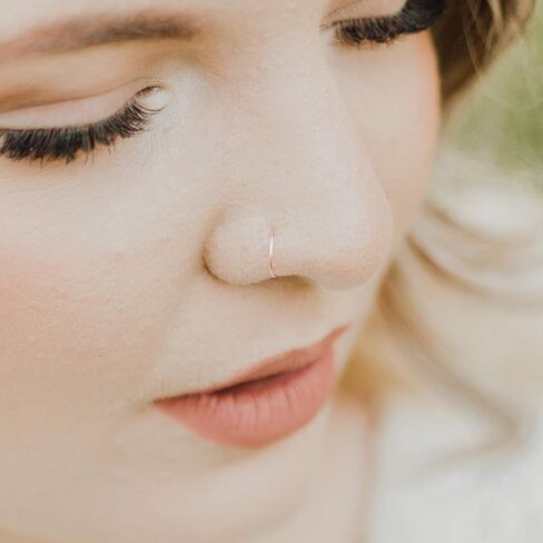 Delicate 24 g Silver Thin Nose Ring - 24 Gauge Hoop - 24g 7mm - 9mm Inner Diameter Slightly Adjustable in Saudi Arabia