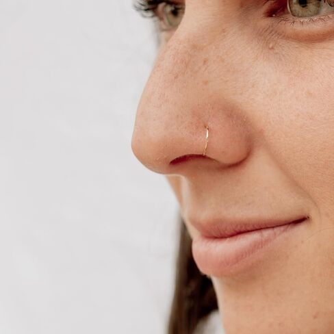 Delicate 24 g Silver Thin Nose Ring - 24 Gauge Hoop - 24g 7mm - 9mm Inner Diameter Slightly Adjustable in Saudi Arabia