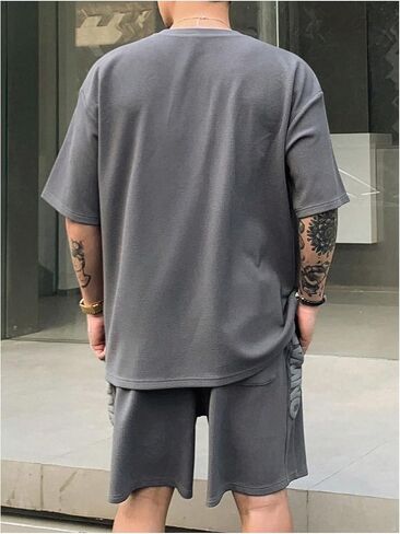 Verdusa Men's 2 Piece Summer Tracksuit Drop Shoulder Graphic Tees and Casual Shorts with Pockets in Saudi Arabia