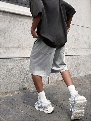 SHENHE Men's Baggy Sweat Shorts Drawstring Waist Wide Leg Raw Hem Loose Streetwear Shorts with Pockets Summer in Saudi Arabia