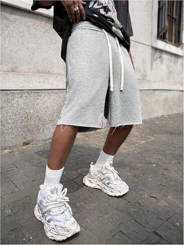 SHENHE Men's Baggy Sweat Shorts Drawstring Waist Wide Leg Raw Hem Loose Streetwear Shorts with Pockets Summer in Saudi Arabia