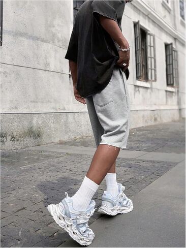 SHENHE Men's Baggy Sweat Shorts Drawstring Waist Wide Leg Raw Hem Loose Streetwear Shorts with Pockets Summer in Saudi Arabia