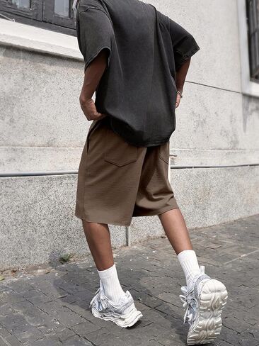 SHENHE Men's Baggy Sweat Shorts Drawstring Waist Wide Leg Raw Hem Loose Streetwear Shorts with Pockets Summer in Saudi Arabia