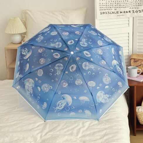 Jellyfish & Capybara Cartoon Transparent Umbrella – 8-Rib Windproof & Waterproof Folding Umbrella, Auto Open & Close Travel Umbrella with Strap in Saudi Arabia