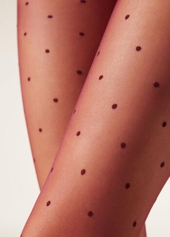 Woman's Sheer polka dot tights in Saudi Arabia