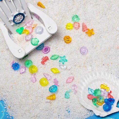 QEQEKAKA 100pcs Ocean Sensory Bin Kit - Plastic Seashells Acrylic Gems for Diving Toys, Vase Filler Decor, Mermaid Pool Toy Treasure Hunt (0.5"-1.3" Fake Beach Shells) in Saudi Arabia