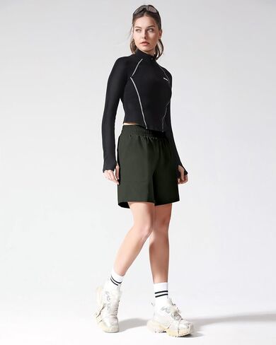 شورت رياضي نسائي مقاس 7 بوصات للتمارين الرياضية وخفيف الوزن وسريع الجفاف وجيوب مبطنة in Kuwait