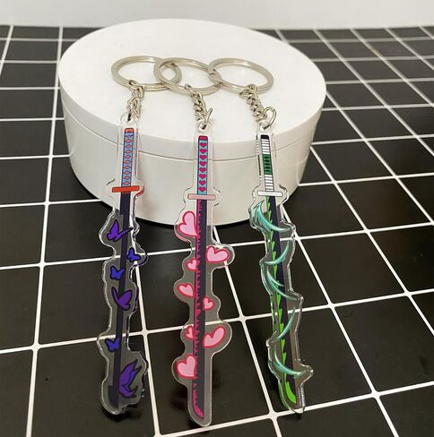 سلاسل مفاتيح الأنيمي ، سلسلة مفاتيح أنيمي أكريليك 12pc ، سلسلة مفاتيح 9pcs المعدنية Katana ، مجموعة Rengoku Sword Keychain Merch in Saudi Arabia