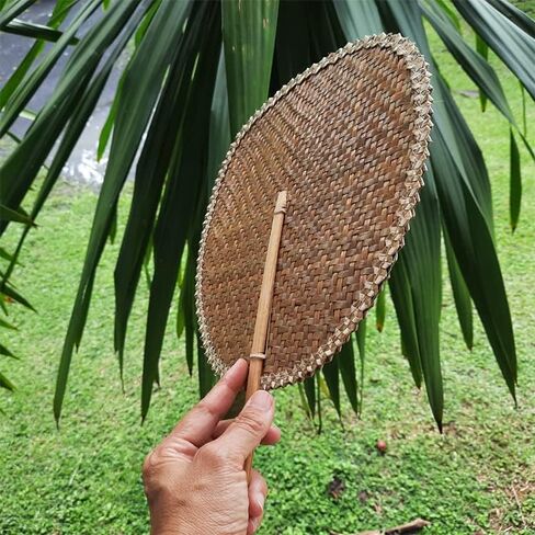 عبوة واحدة من مروحة يد من أوراق النخيل مصنوعة يدويًا من إنتاج تايلاند فكرة لمستلزمات الحفلات ونمط الزفاف العتيق in Kuwait