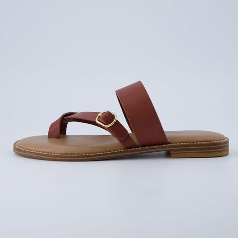 CUSHIONAIRE Laws Women’s Flat Sandal – Faux Leather Slip-On with Toe Loop, Adjustable Buckle & Cushioned Footbed in Saudi Arabia