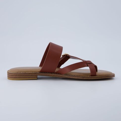 CUSHIONAIRE Laws Women’s Flat Sandal – Faux Leather Slip-On with Toe Loop, Adjustable Buckle & Cushioned Footbed in Saudi Arabia