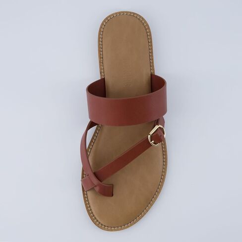 CUSHIONAIRE Laws Women’s Flat Sandal – Faux Leather Slip-On with Toe Loop, Adjustable Buckle & Cushioned Footbed in Saudi Arabia