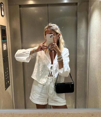 Bow Tie Front Tops for Women Casual Lace Up Bow Shirts Hollow Out V Neck Long Flare Sleeve Blouses Tops in Saudi Arabia
