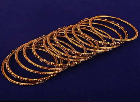 Touchstone "Golden Bangle Collection Indian Bollywood Rhinestone Charming Look Designer Jewelry Bangle Bracelets for Women in Antique Gold Or White Tone in Saudi Arabia