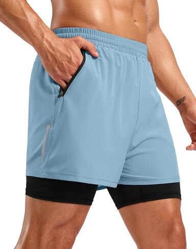 Pudolla Men's 7 "شورت مع جيوب سحاب سريعة 2 في 1 شورت صالة الألعاب الرياضية مع بطانة لتدريب اليوغا التنس in Kuwait
