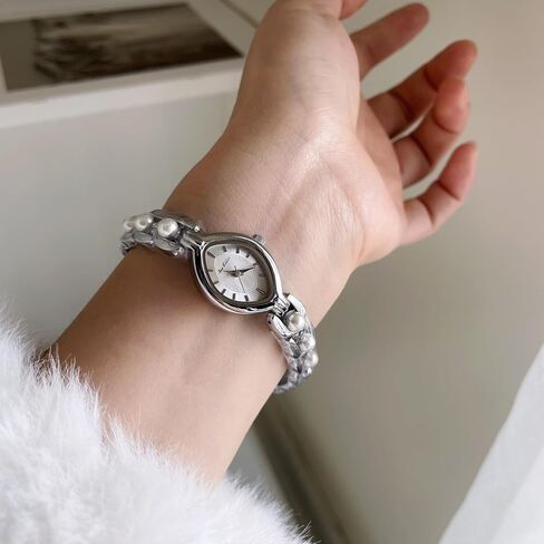 FANMIS Elegant Hollow Four Leaf Clover Womens Bracelet Gold Tone Watch Waterproof Luxury Diamond Dress Ladies' Bracelet Watch Four Leaf Clover Design Ladies' Timepiece in Saudi Arabia
