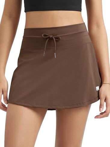 ODODOS Women's Drawstring Tie Daily Skirts Built-in Shorts Athletic Golf Tennis Skorts with Ball Pocket in Saudi Arabia
