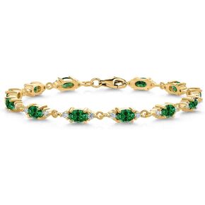 GEM Stone King 18K الذهب الأصفر الفضي المطلي باللون الأخضر المخلوق الزمرد وسوار تنس Moissanite الأبيض للنساء (5.11 CTTW ، أحجار الأحجار الكريمة ، 6x4mm ، 6.5 بوصة)