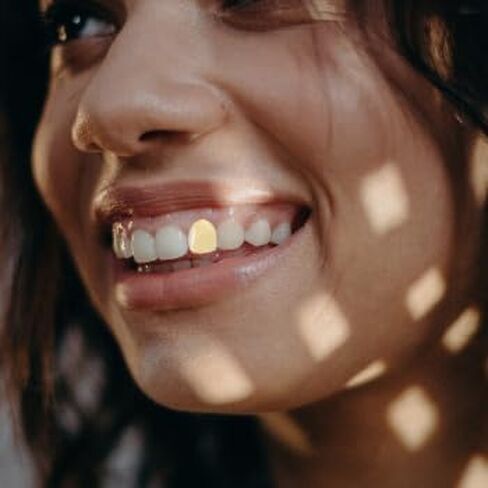 2Pcs Gold Plated Single Tooth Cap Hip Hop Teeth Plain Grillz Caps Top Bottom Dental Grill For Men Hip Hop Golden in Saudi Arabia