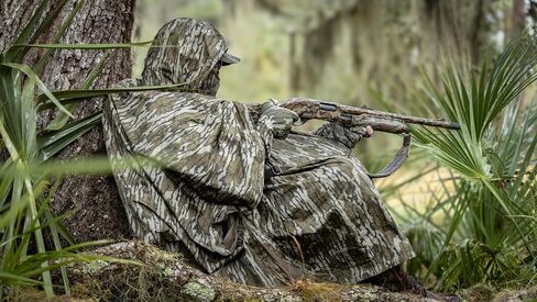 Nomad Men Poncho Plackplable Camo Rain Poncho ، Mossy Oak Bottomland ، حجم واحد in Kuwait