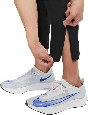 Nike Dri-FIT Challenger Men's Woven Running Pants, Large Black in Saudi Arabia