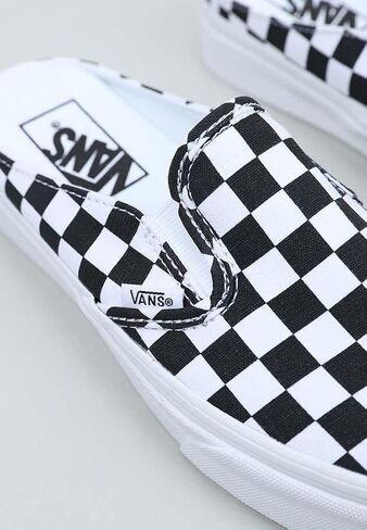 Vans Men's Classic Slip On Sneaker, (Mule) Checkerboard Black/True White, Size in Saudi Arabia