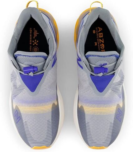 New Balance Men's FuelCell Rebel TR V1 Running Shoe, Deep Violet/Pink Glo, 12 in Saudi Arabia