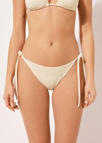 Woman's String Swimsuit Bottoms Crinkle Waves in Kuwait