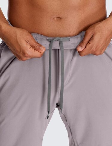 CRZ YOGA Men's 2 in 1 Running Shorts with Liner - 7'' Quick Dry for Workout Sports Athletic with Pockets in Saudi Arabia