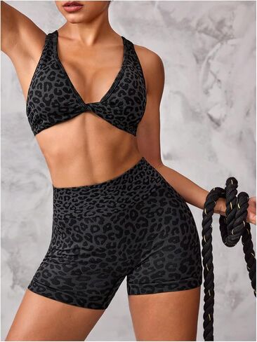 Women's 2 Piece Leopard Print Athletic Outfits Criss Cross Sports Bra and Biker Shorts Gym Tracksuits in Saudi Arabia