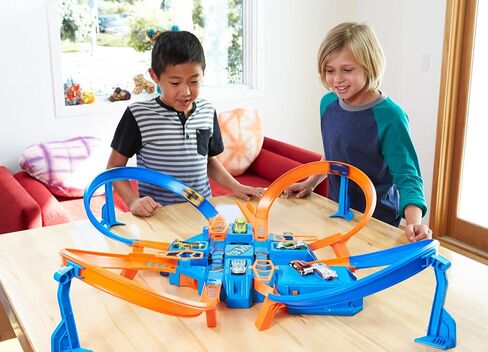 Hot Wheels Toy Car Track Set, Criss Cross Crash with 1:64 Scale Vehicle, Powered by a Motorized Booster (Amazon Exclusive) in Saudi Arabia