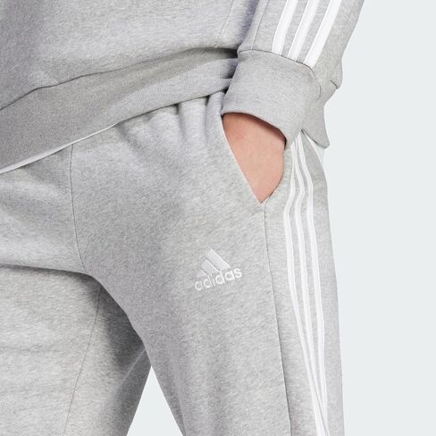 adidas Men's Essentials Fleece Tapered Cuffed 3-Stripes Pants, Black/White, Small in Saudi Arabia