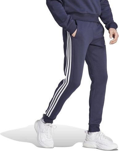 adidas Men's Essentials Fleece Tapered Cuffed 3-Stripes Pants, Black/White, Small in Saudi Arabia