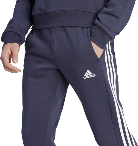 adidas Men's Essentials Fleece Tapered Cuffed 3-Stripes Pants, Black/White, Small in Saudi Arabia