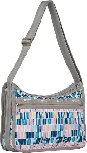 LeSportsac Painted Tiles Deluxe Everyday Crossbody Bag + Cosmetic Bag, Style 7507/Color F978, Illuminating Kaleidoscope of Multi-Tonal Rectangular Shaped Tiles, Shades of Navy, Turquoise, Pink & More in Saudi Arabia