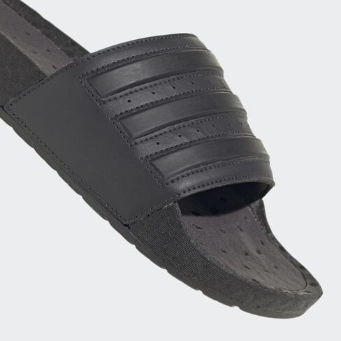 adidas Unisex Adilette Boost Slides Sandal, Carbon/Black/Black, 7 US Men in Saudi Arabia