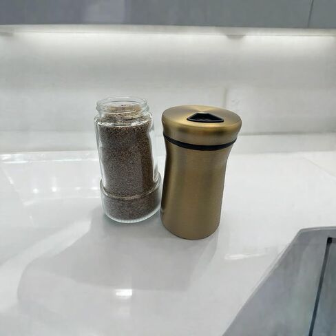Elegant Silver Salt and Pepper Shaker Set Adjustable Stainless Steel and Glass Modern Design Adjustable Top Makes it the ideal Spice and Seasoning Dispenser Kitchen Sugar and Cinnamon Shakers in Saudi Arabia